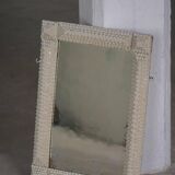 Wall mirror in tramp art style, hand-carved with a painted white frame, early 1900s.