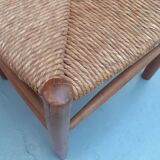 Pair of wooden chairs with seat and straw back