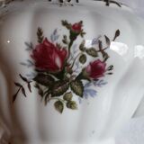 Musical teapot in white porcelain with floral decoration