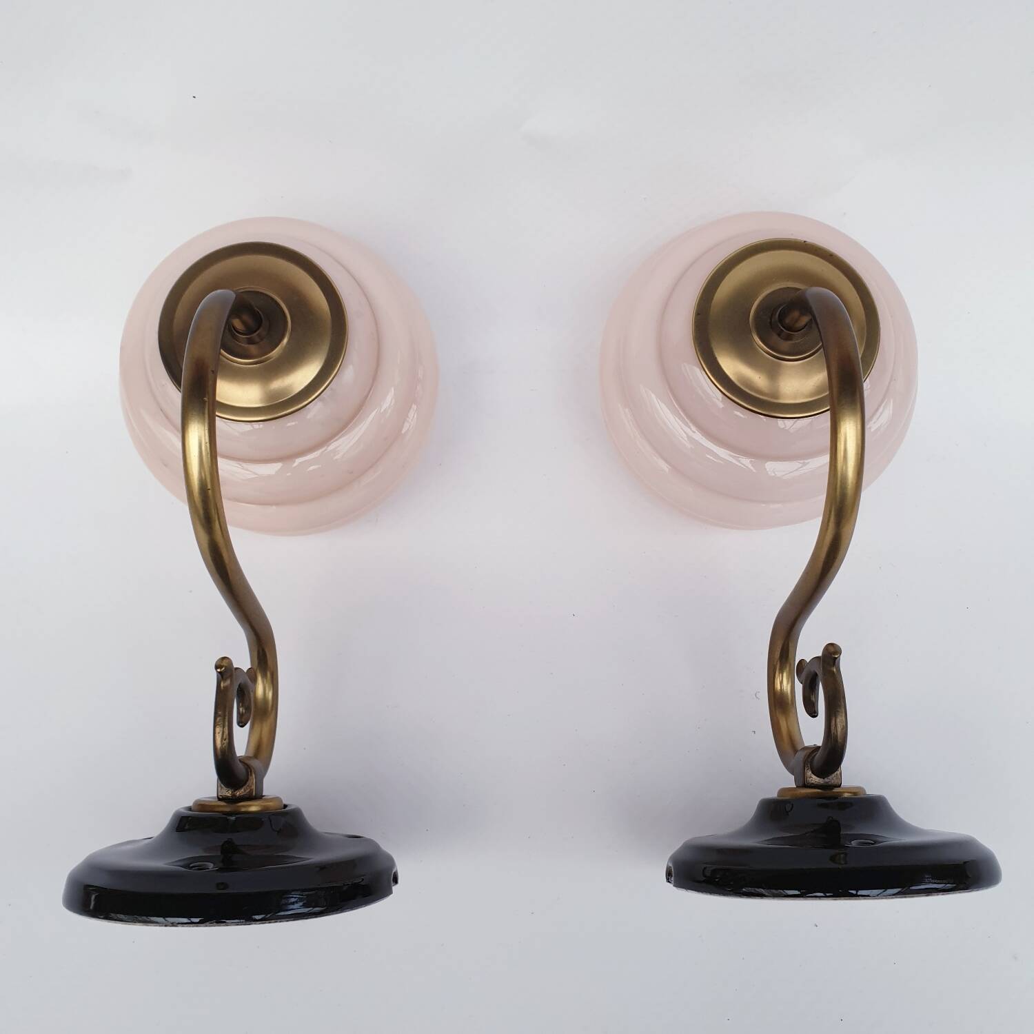 Brass and glass swan neck wall lights