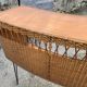 Vintage 1950s bar counter with its two rattan and metal stools.
