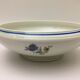 Salad bowl " Lourioux Foëcy " with flower motifs.