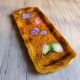 Vintage barbotine pocket dish from Salins les Bains, relief decoration of fruits.