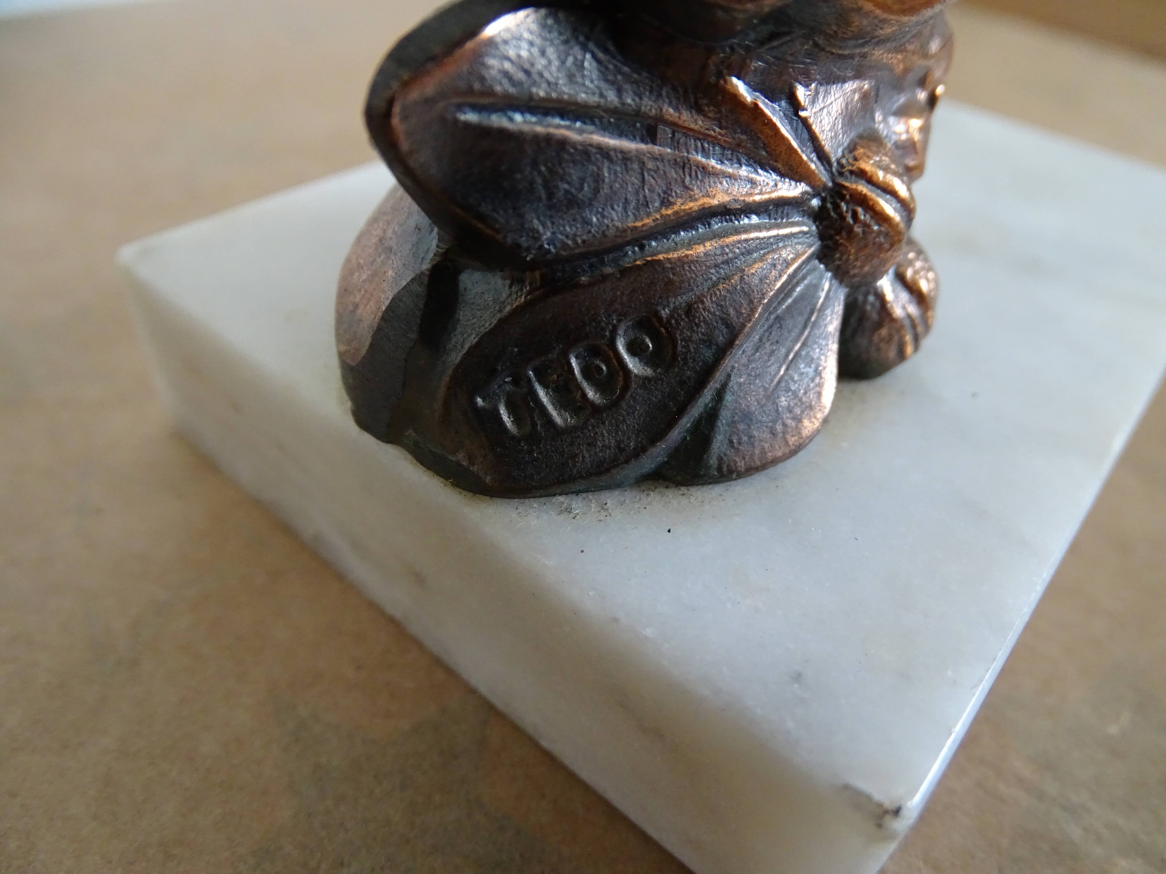 Pair of bookends signed Tedo