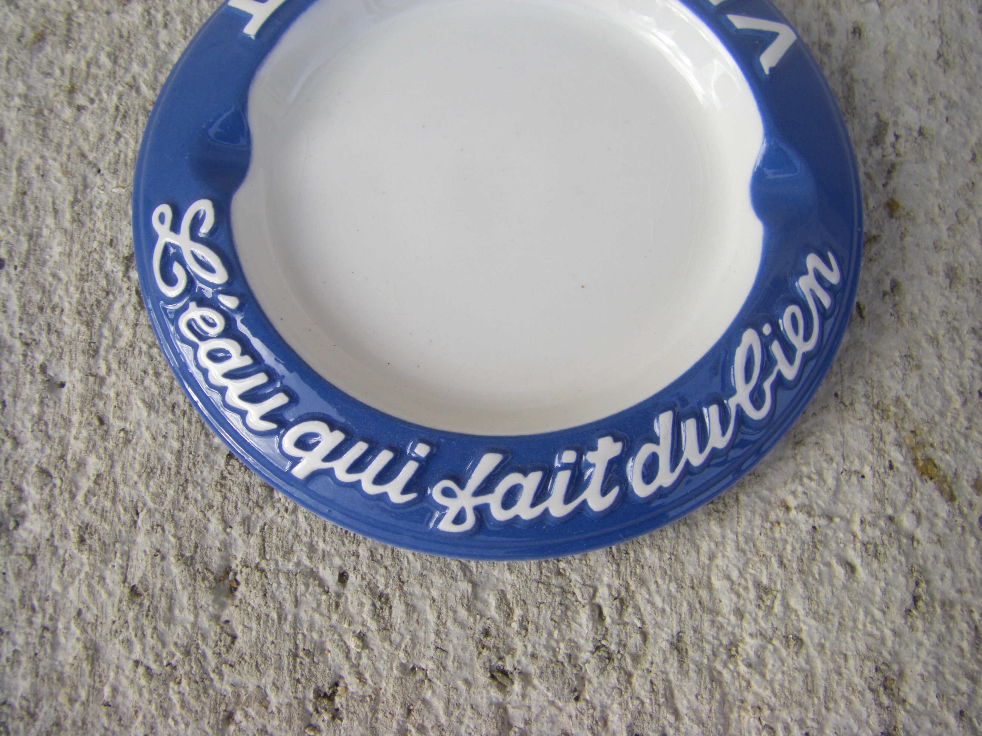 Two advertising ashtrays