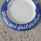 Two advertising ashtrays