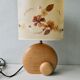 Wooden lamp with its herbarium lampshade from the 70s
