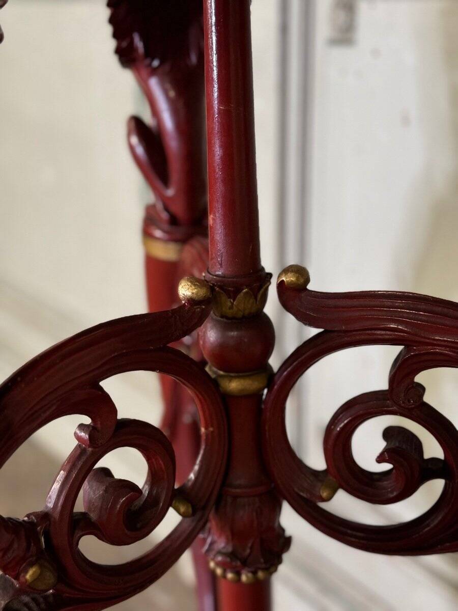 Athenian carved wood, red patina imitation of red marble