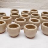 Set of 17 buckets sandstone snails