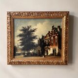 Dutch street scene oil painting in ornate frame signed Nijland