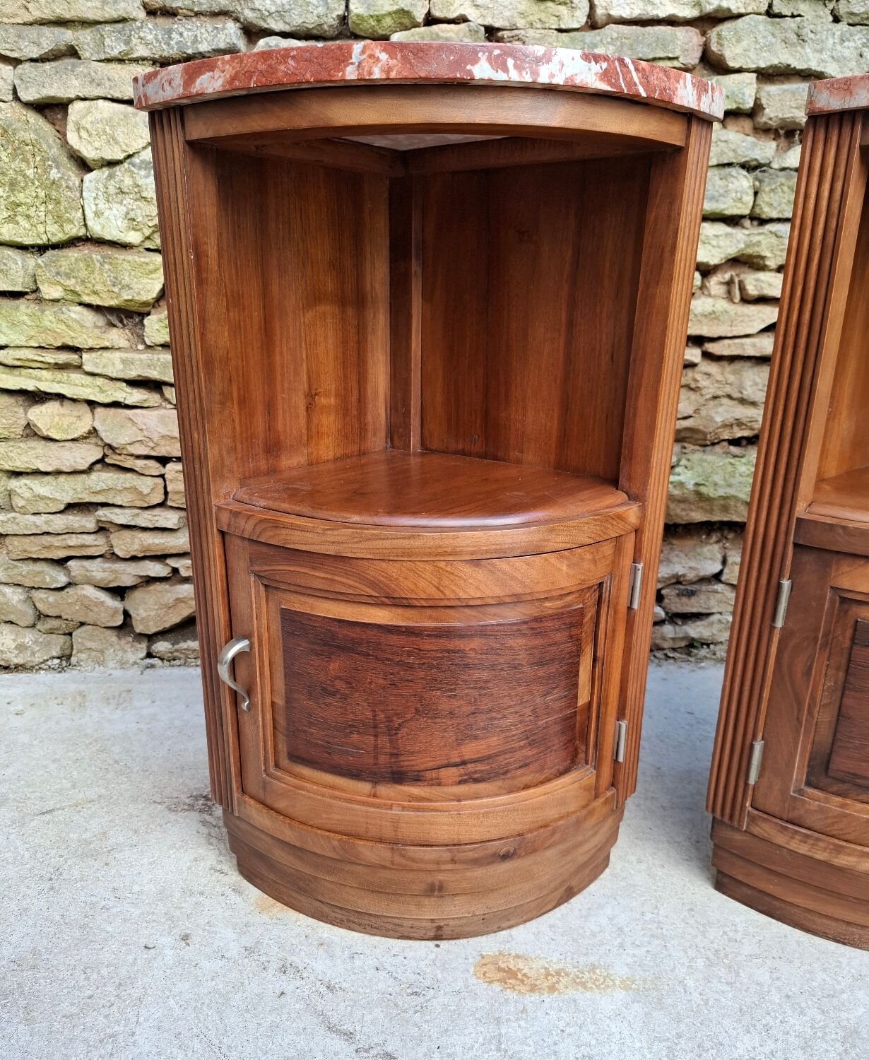 Corner bedside tables, in walnut