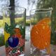 Vintage set of 4 fruit-decorated orangeade glasses.