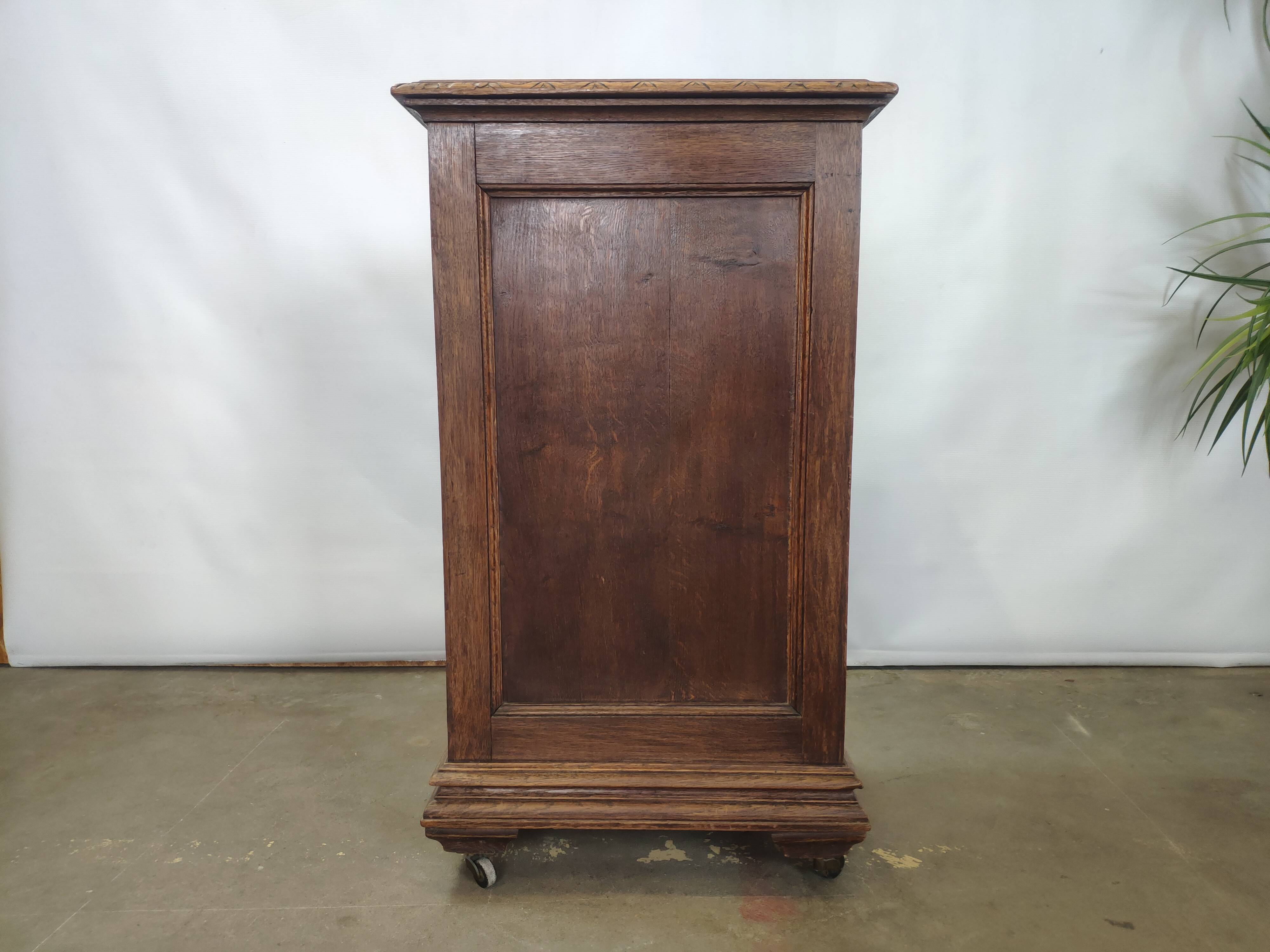 Bedside table carved in oak