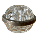 Pique flowers in metal circled glass