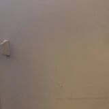 Beige wooden bookshelf