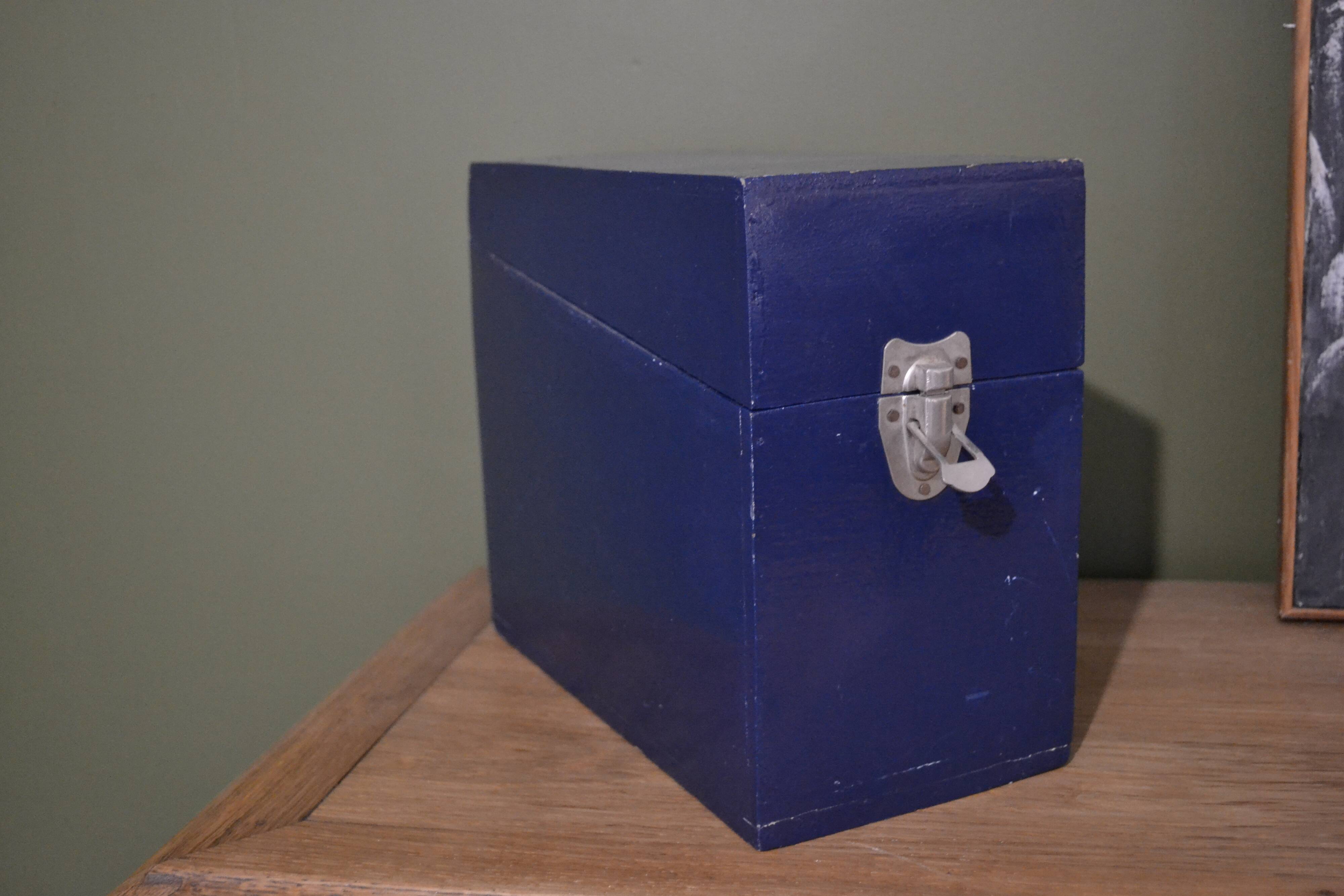 Blue painted wooden plug box