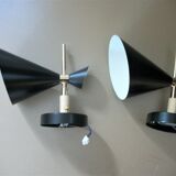 Pair of dialog-form sconces
