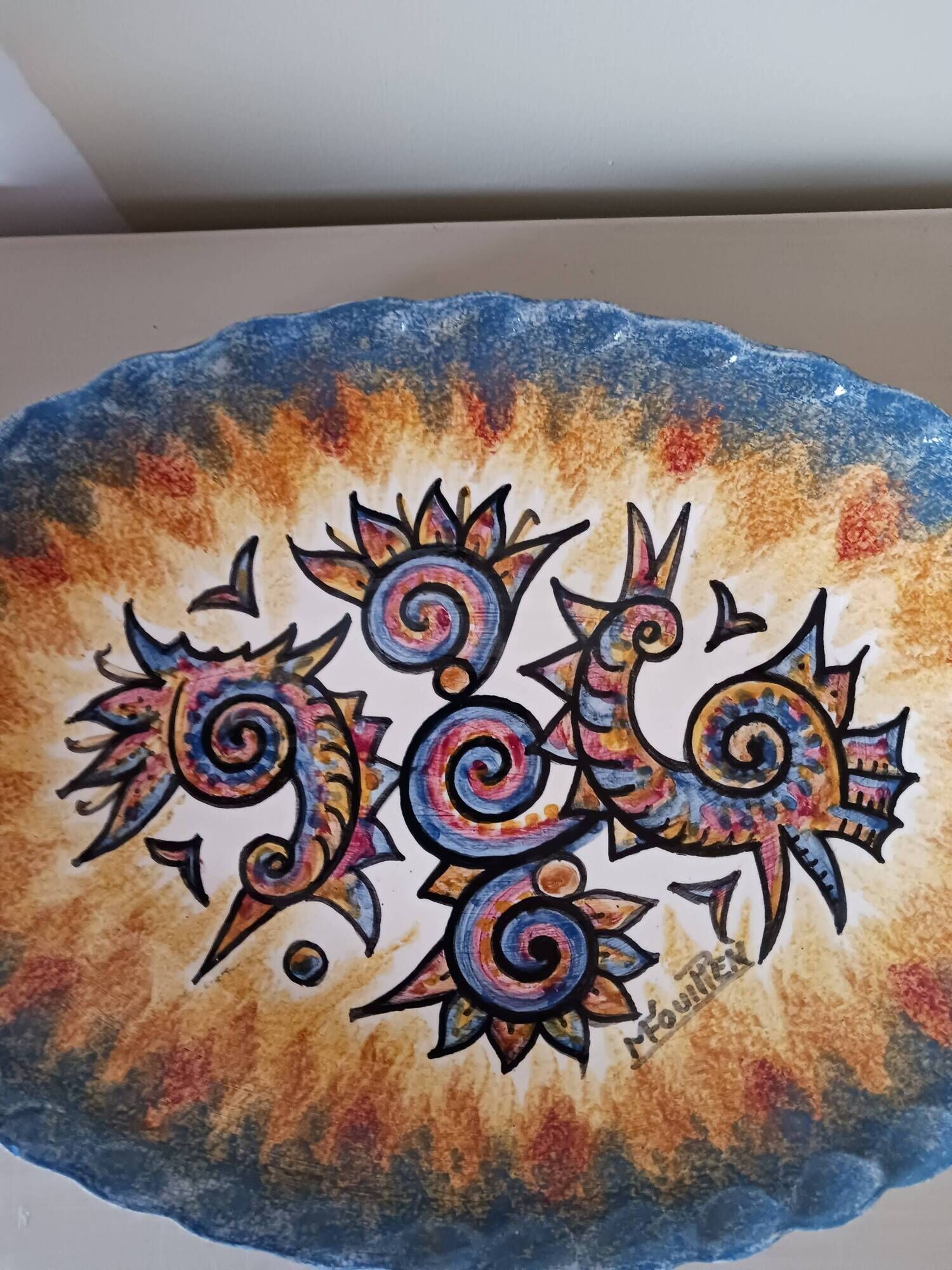 Earthenware plate by Paul Fouillen.