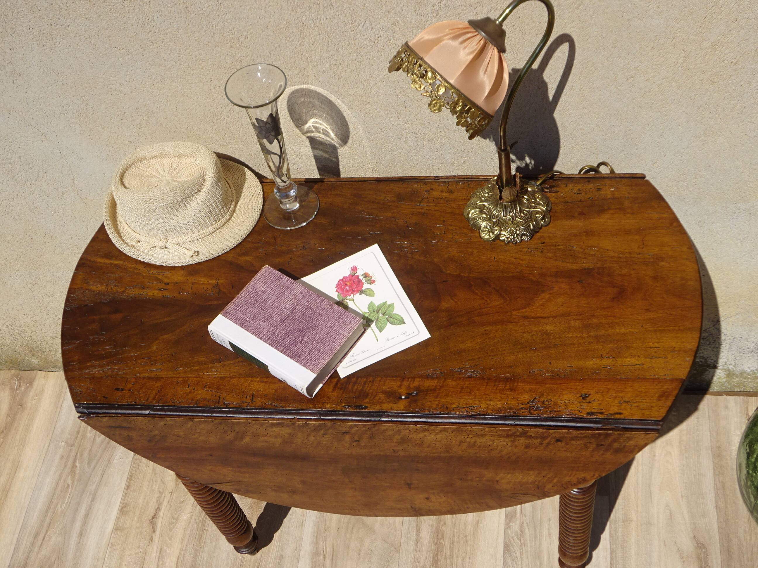 Antique walnut console table with honey spoon legs.