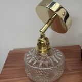 Gold tilting wall light
