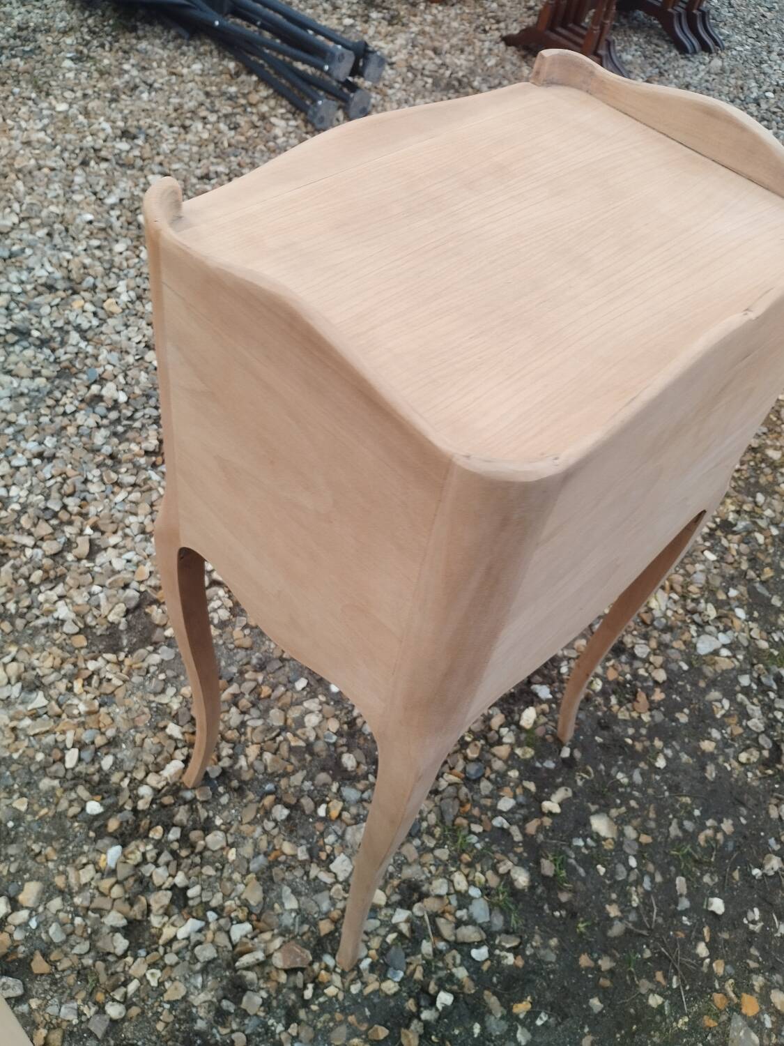 Pair of antique wooden bedside tables in Louis XV style.