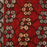 Kilim anatolien ancien tons rouges et beiges, motifs tribaux colorés