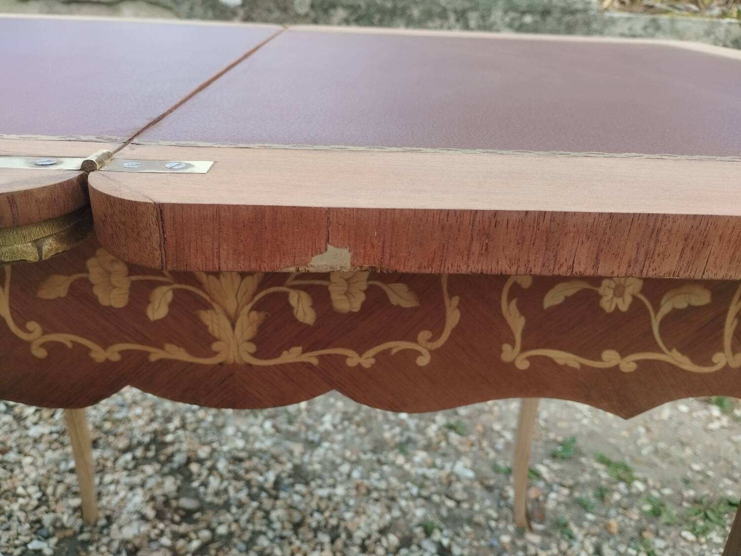Antique game table in Louis XVI style with marquetry.