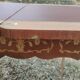 Antique game table in Louis XVI style with marquetry.