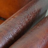 Vintage set of 4 sheepskin leather dining chairs on castors