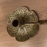 Brass candle holder on frame