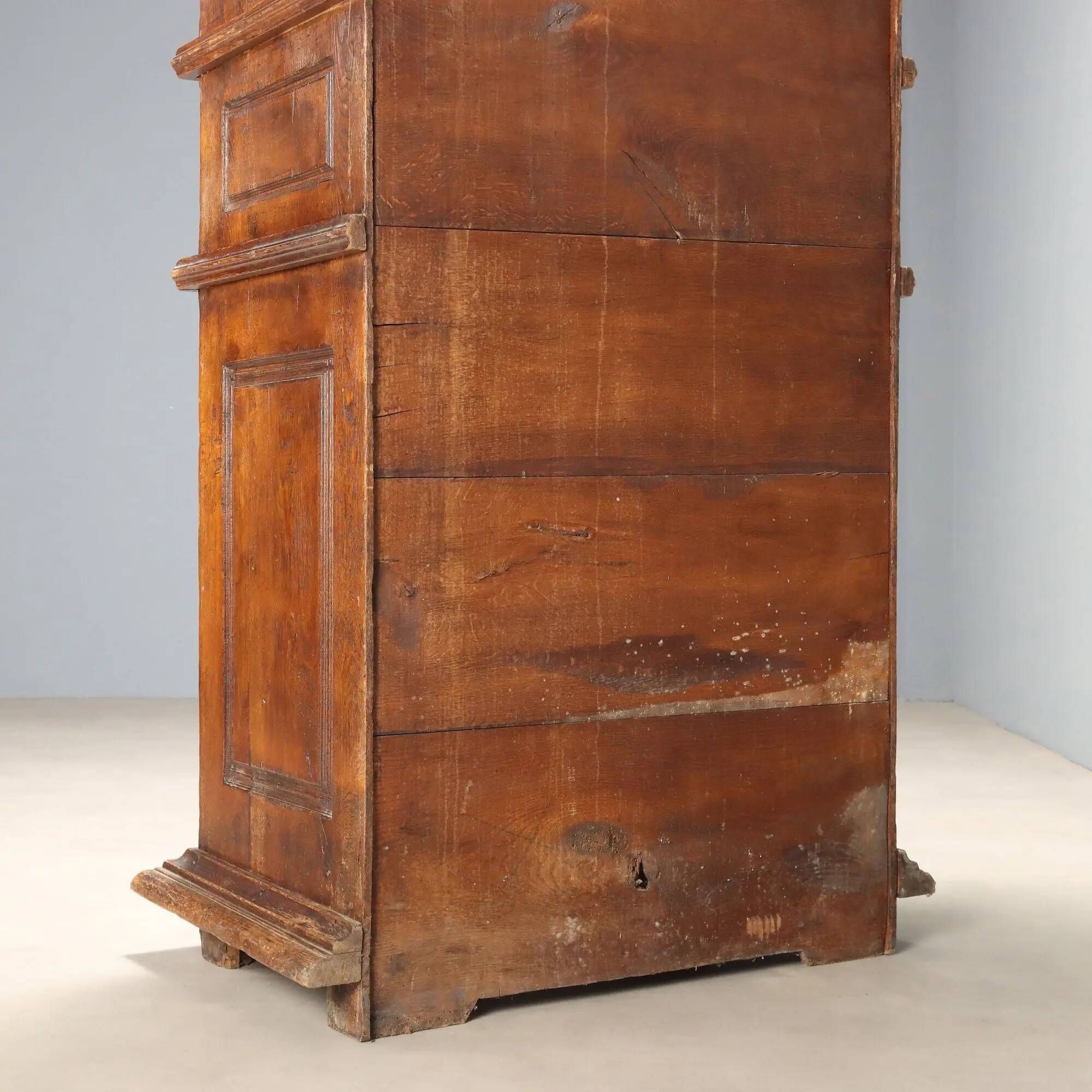 Antique baroque wardrobe in oak with safe, Italy, late 19th century.