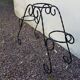 Black wrought iron plant holder