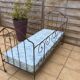 Wrought iron bed - new bespoke mattress.