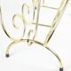 Golden wire magazine rack 1960