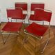 Set of 4 chairs in red leather and chrome tubular metal