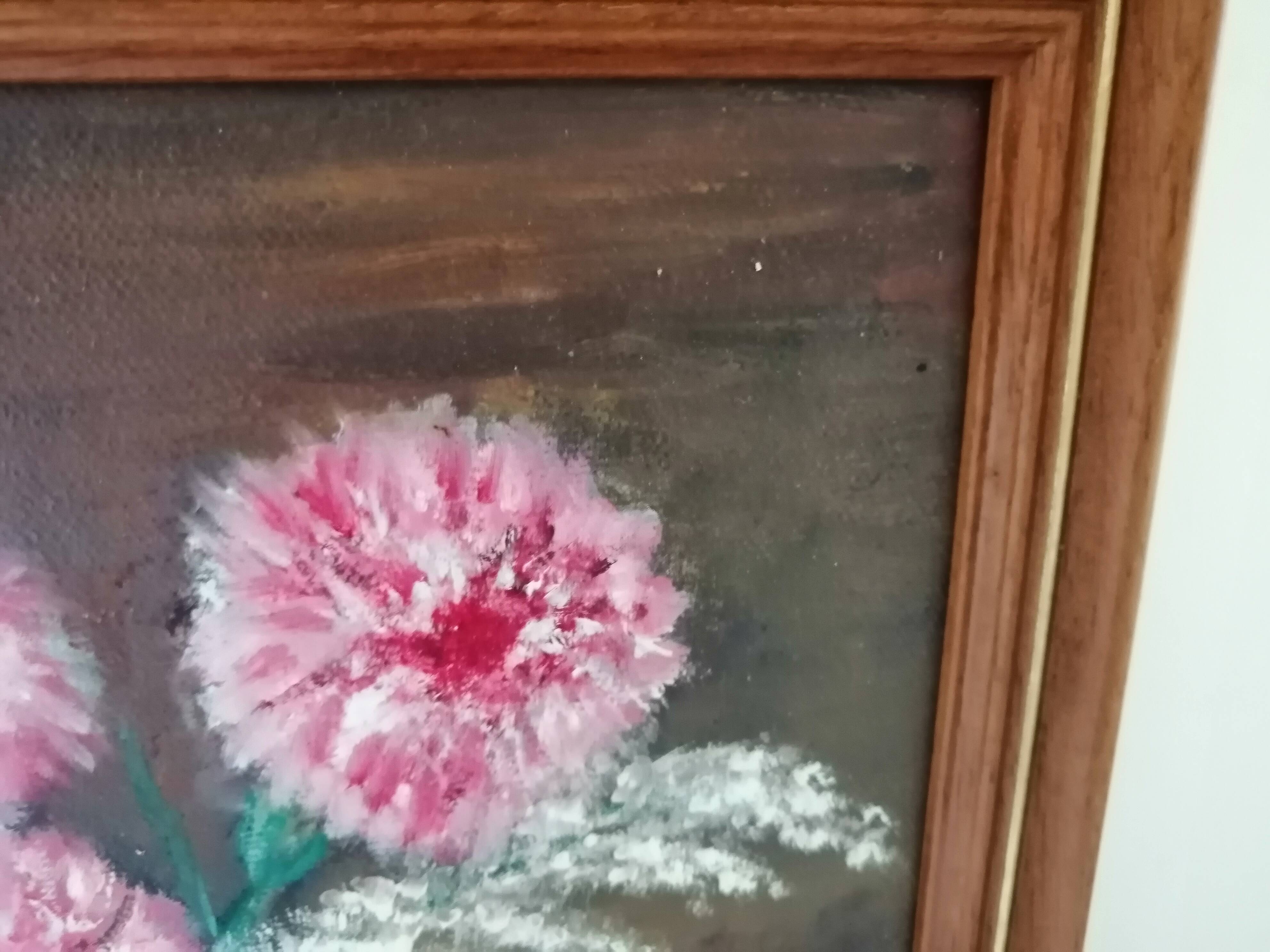 Still life with oil flowers on ancient panel