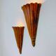 Pair of Art Deco carved wood wall sconces, France, 1930s