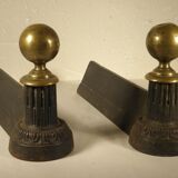 Pair of cast iron and brass chenets