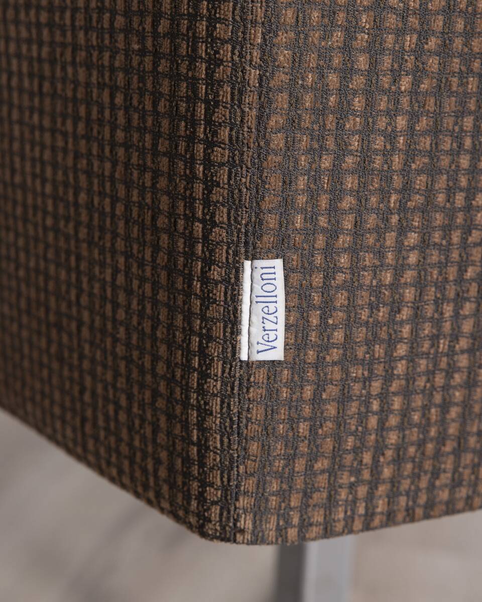 "Cubica" metal and fabric swivel armchair designed by Verzelloni