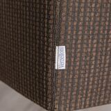 "Cubica" metal and fabric swivel armchair designed by Verzelloni