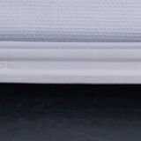 white glazed ceramic wall shelf from the 60s
