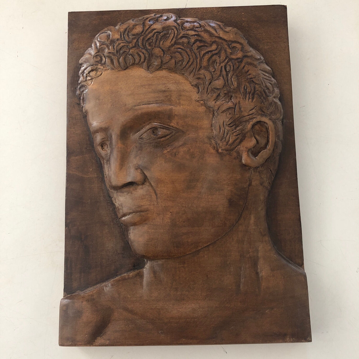 Wood carving profile man signed