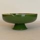 Vintage green ashtray on foot