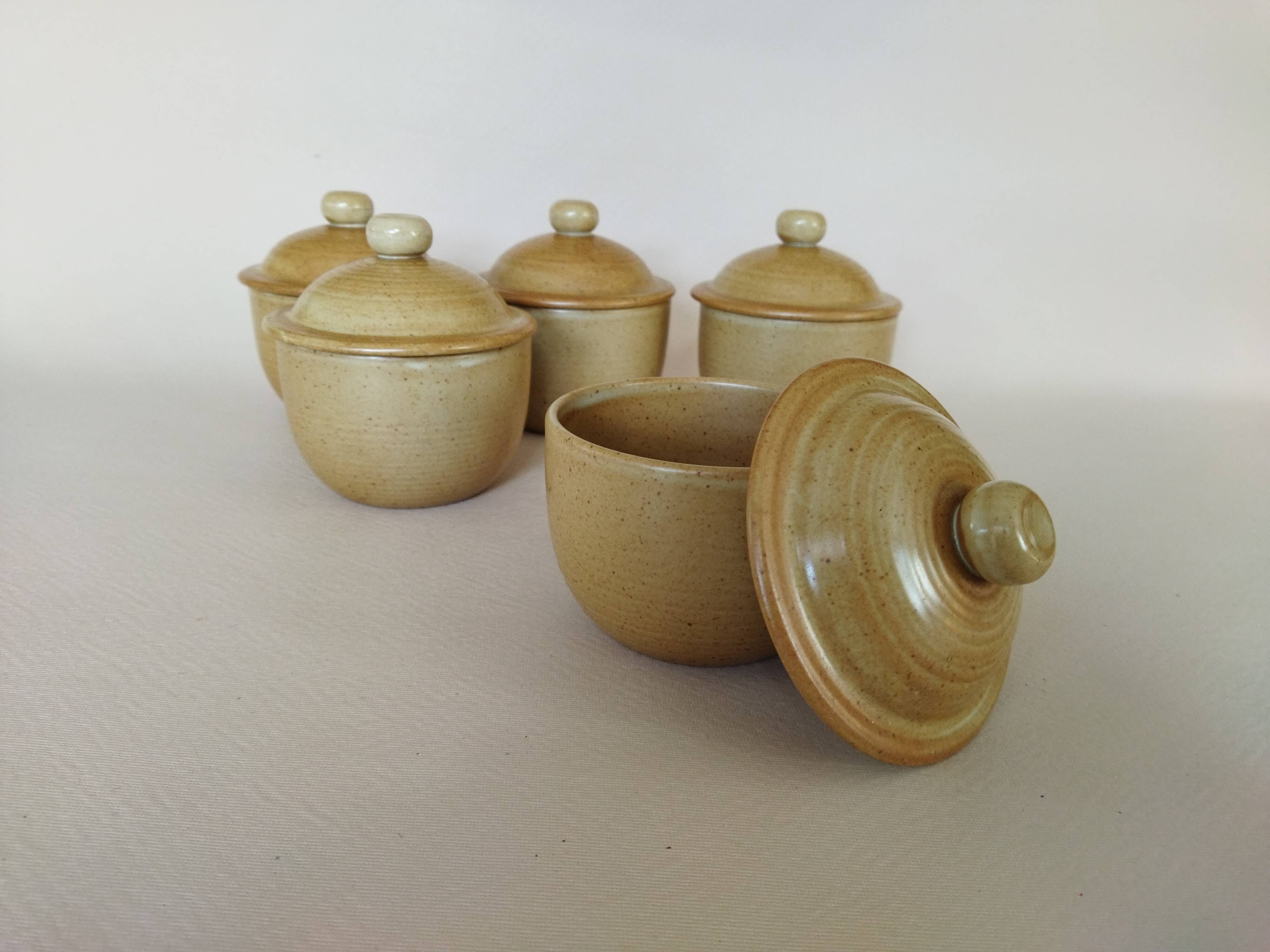 Covered tea bowls in CNP Village sandstone