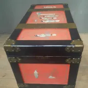 Red lacquered wooden mallet from the Far East.