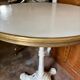 Bistro table in cast iron and beige melamine ⌀ 60 cm