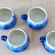 Service of 4 blue ceramic cups and saucers from the 1950s