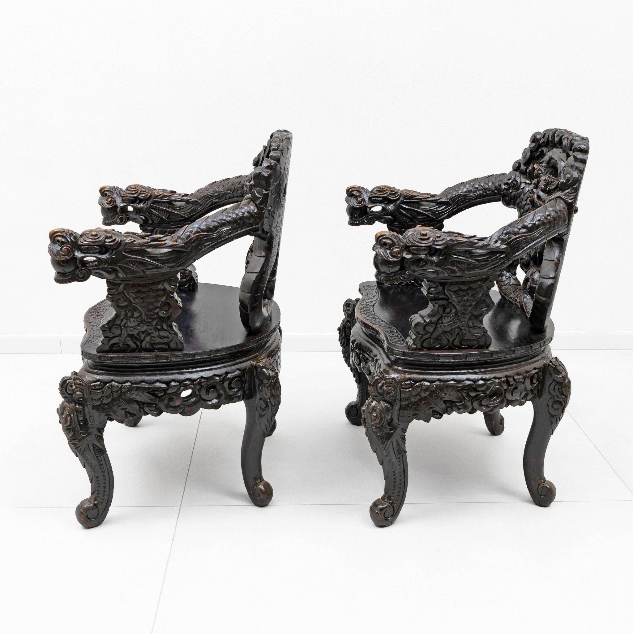 Pair of Chinese Qing Dynasty Carved Dragon Armchairs,Ebonized Hardwood,19th