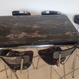Table and 6 chairs in black formica marble effect