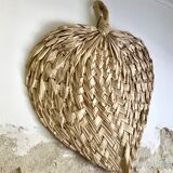 Braided palm leaf eventail